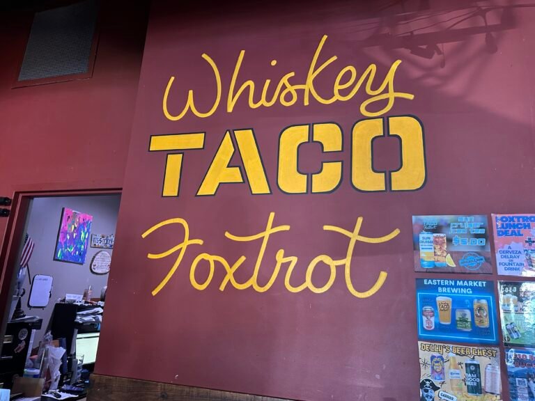 Logo painted on wall of Whiskey Taco Foxtrot