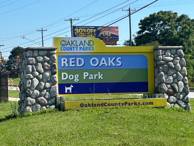 Red Oaks Dog Park sign as seen off of Dequindre Rd