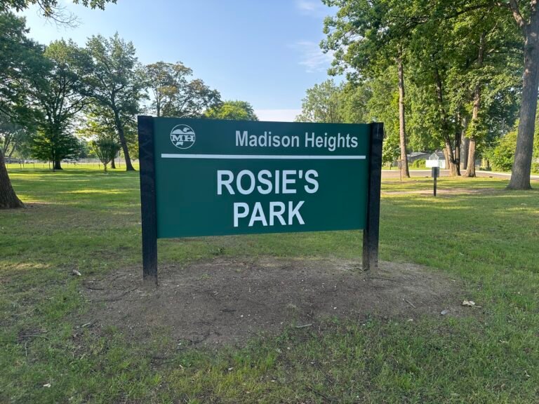 A sign for Rosie's Park Madison Heights