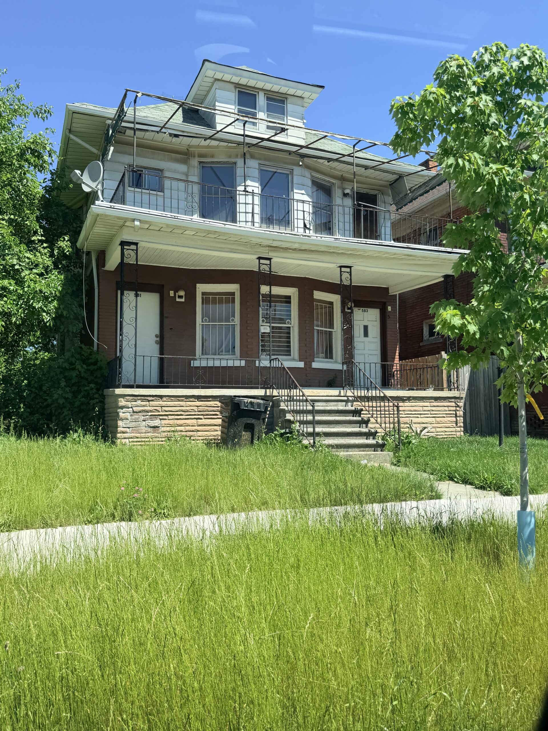 Front porch and upper balcony of Smokey Robinson's childhood home in Detroit's North End