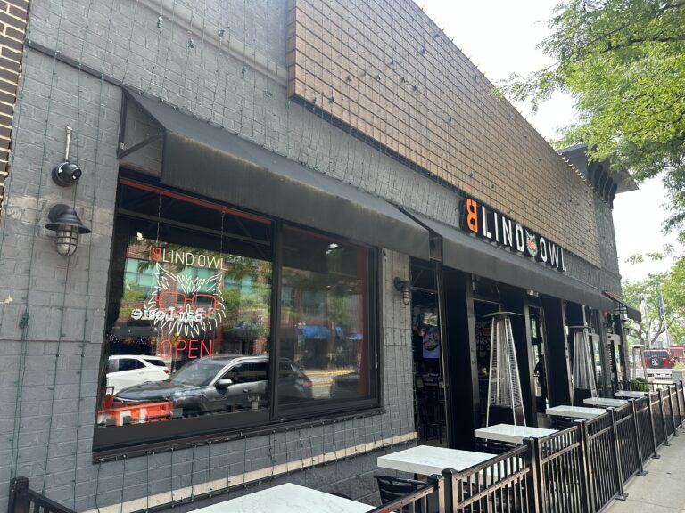 A view of Blind Owl Royal Oak from the street walking up